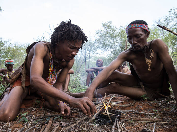 Juhoasi-Khoi-San-Bushman-demonstrating-how-to-start-a-fire.-Anthropological-safari-Xai-Xai-Kalahari-Botswana-uai-720x540